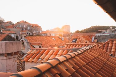 brown roof tiles during daytime